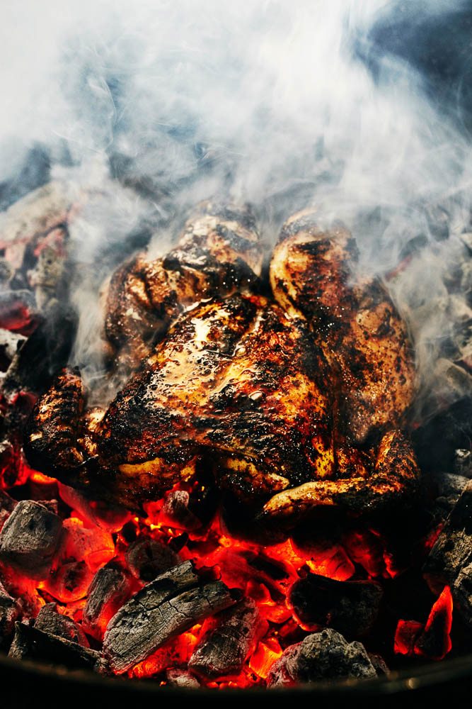 Direct hot coal cooking of Spatchcock chicken_